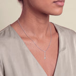 Load image into Gallery viewer, Model wearing the Round Diamond Long Pendant on a fine chain