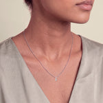 Load image into Gallery viewer, Model wearing the Heart Shaped Diamond Pendant on a fine chain