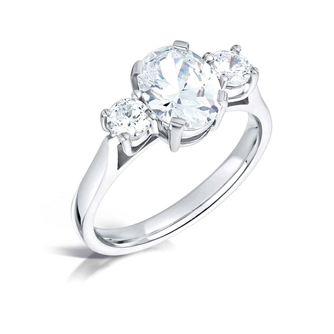 Three Stone Oval And Round Brilliant Diamond High Set Trilogy Ring