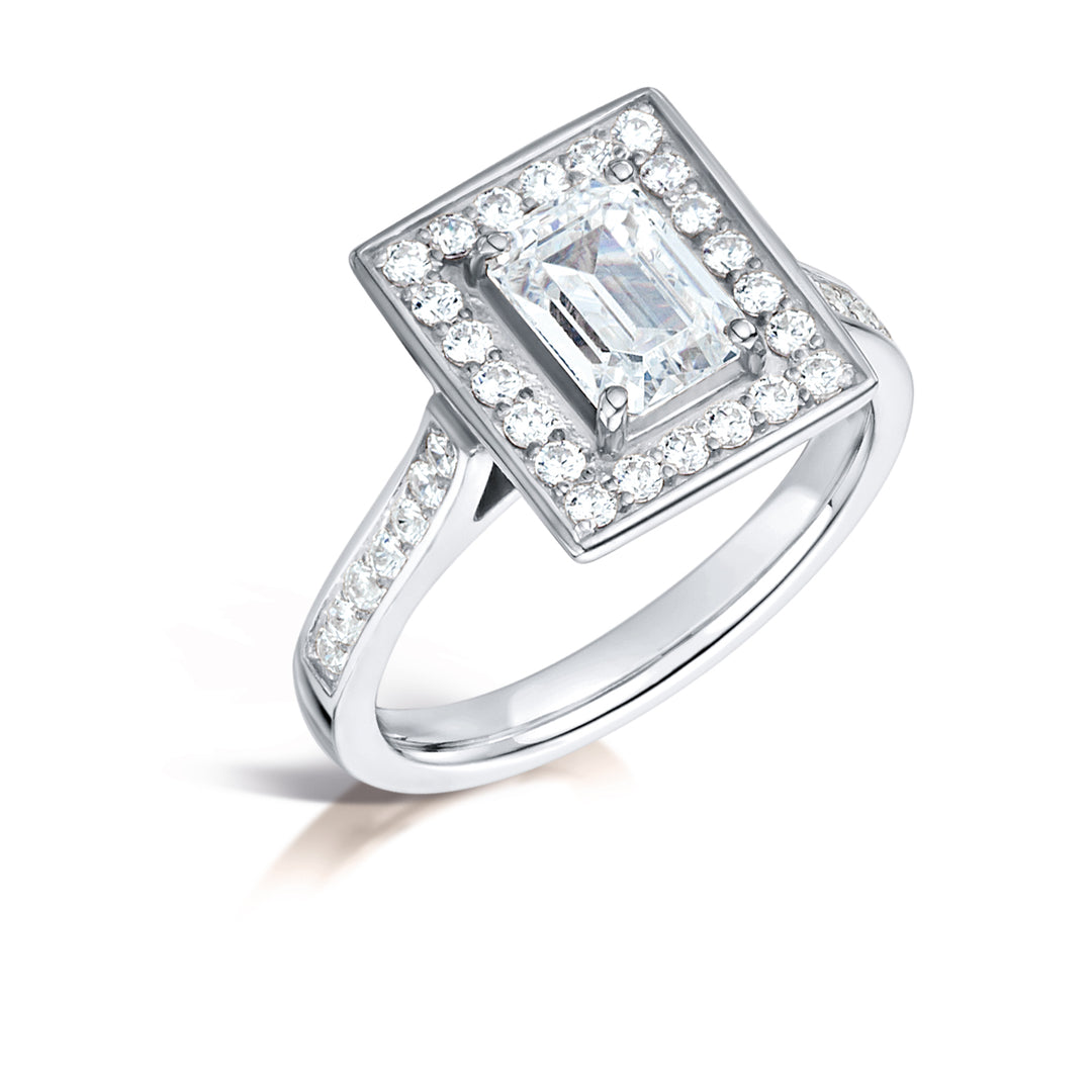 Emerald Cut Diamond Ring In A Grain Set Halo Design