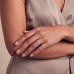 Load image into Gallery viewer, Model wearing the 1.5mm Grain Half Set Diamond Band on her ring finger
