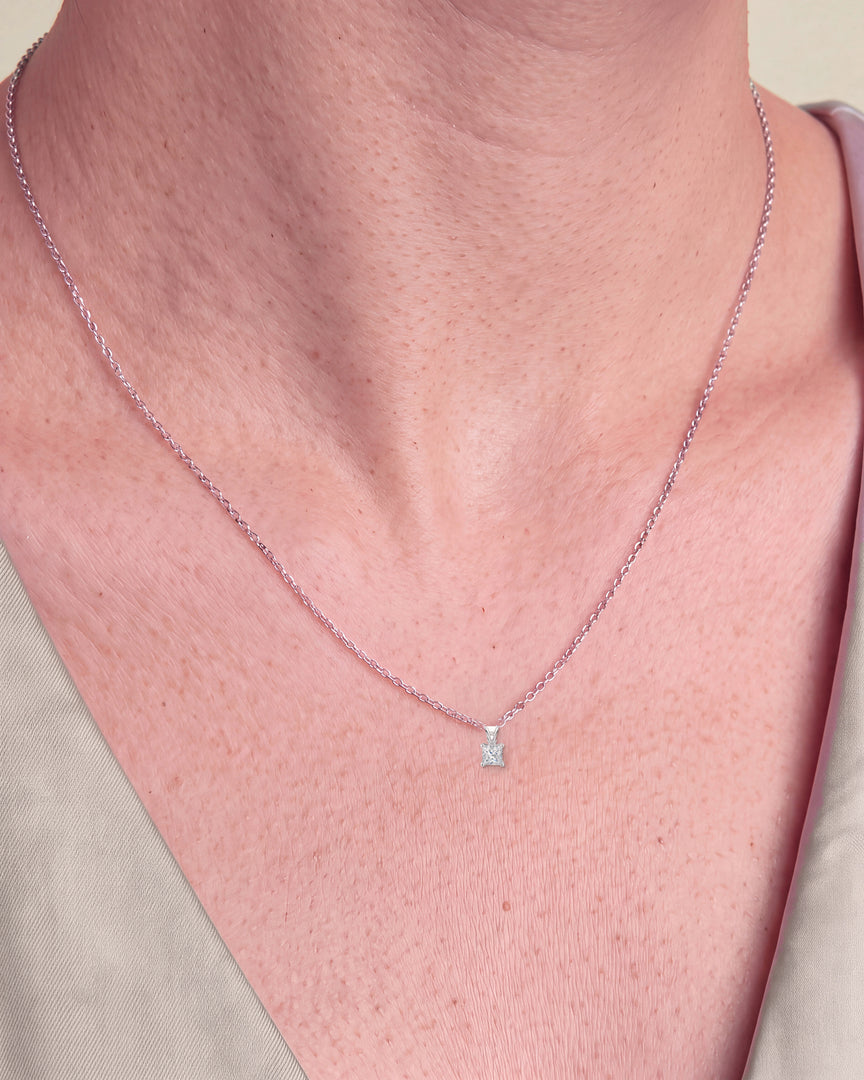 Princess Cut Diamond Pendant worn – close-up on the collarbone