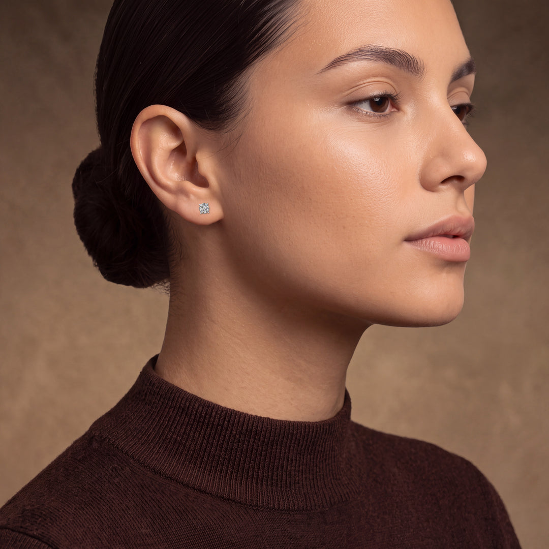 Model wearing the Classic Style 4 Claw Diamond Stud Earrings – side profile