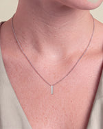 Load image into Gallery viewer, Round Five Stone Diamond Drop Pendant worn – close-up on the collarbone