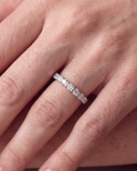 Load image into Gallery viewer, 2.5mm Bar Set Diamond Band worn, close-up on the ring finger