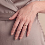 Load image into Gallery viewer, Model wearing the 3mm Traditional Court Wedding Band on her ring finger