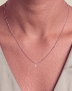 Load image into Gallery viewer, Marquise Style Round Diamond Pendant worn – close-up on the collarbone