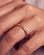 Load image into Gallery viewer, 2mm Traditional Court Wedding Band worn, close-up on the ring finger