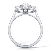 Three Stone Pear Shaped And Round Brilliant Diamond Trilogy Ring.