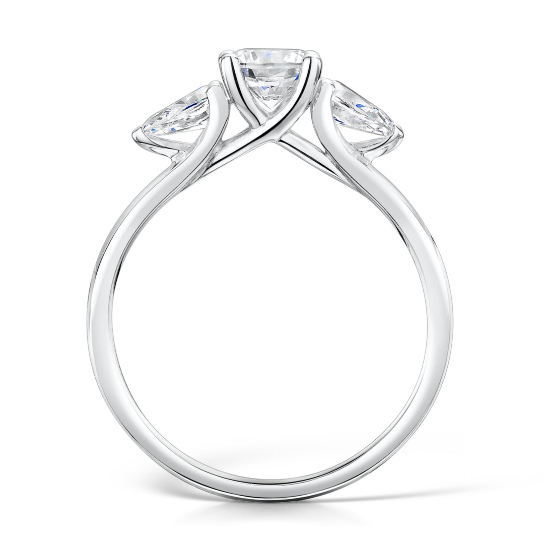 Three Stone Round Brilliant And Pear Shape Diamond Ring