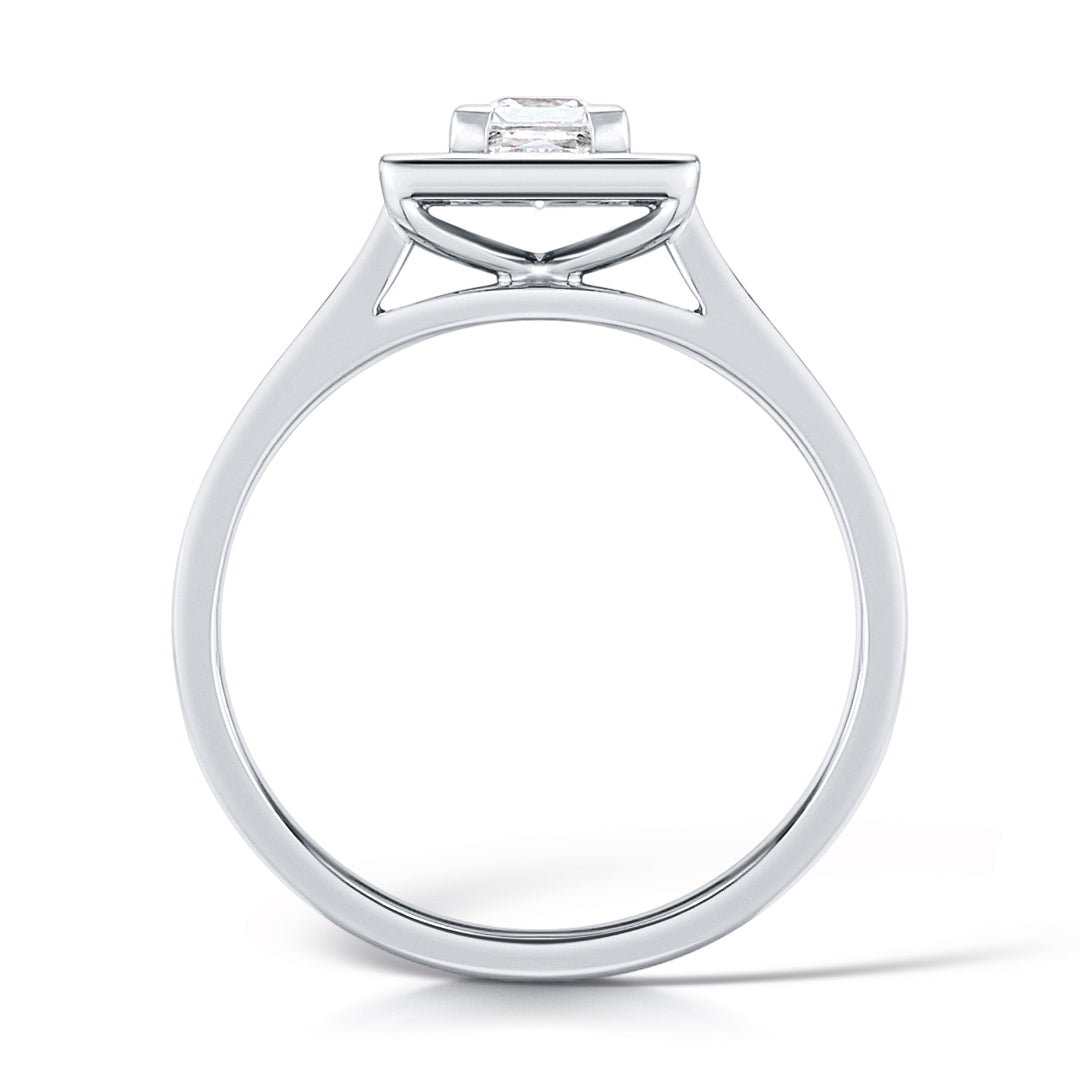 Princess Cut Diamond Ring With A Grain Set Halo Design