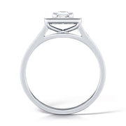 Princess Cut Diamond Ring With A Grain Set Halo Design
