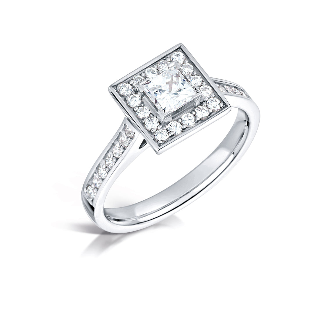 Princess Cut Diamond Ring With A Grain Set Halo Design