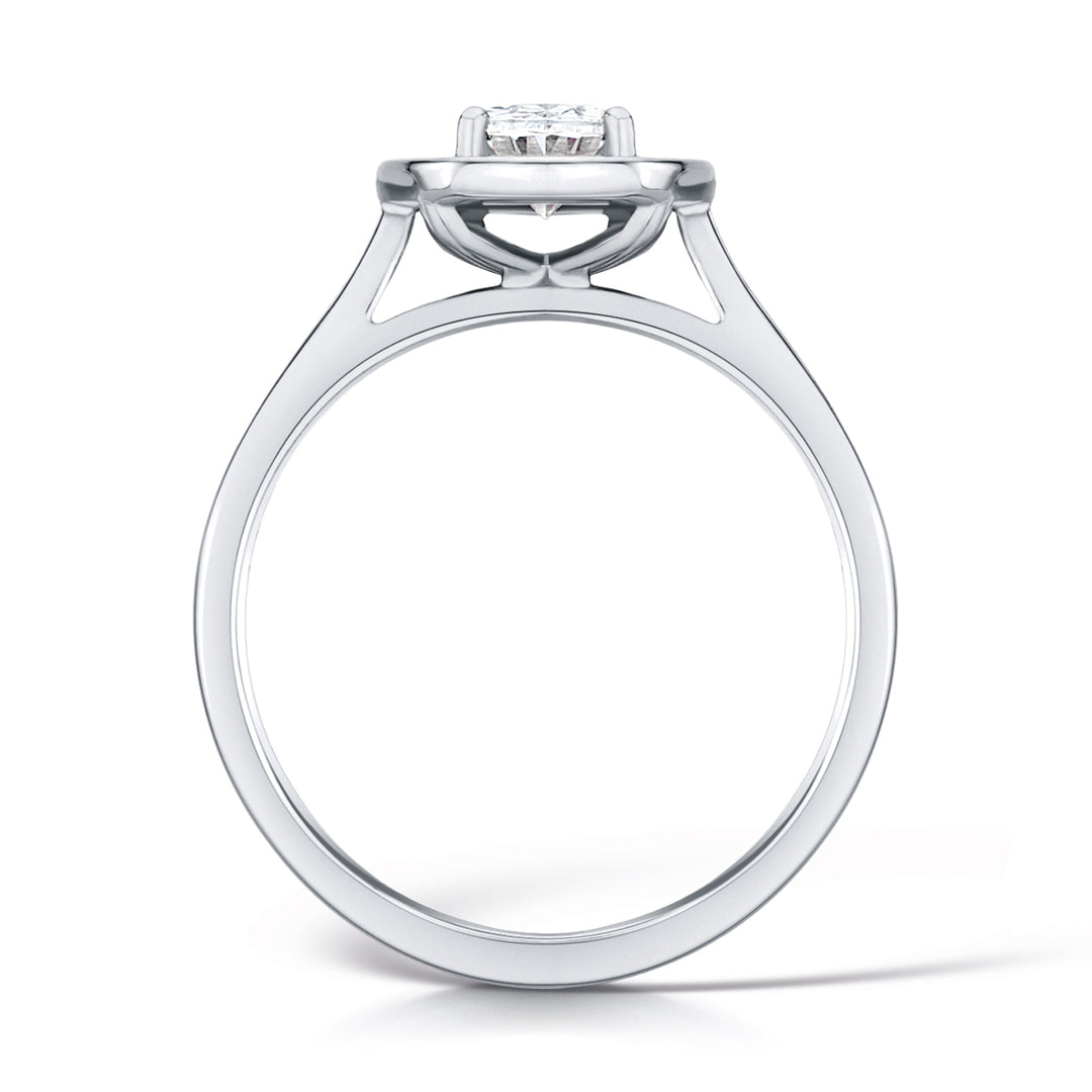 Oval Cut Diamond Ring In A Grain Set Halo Design