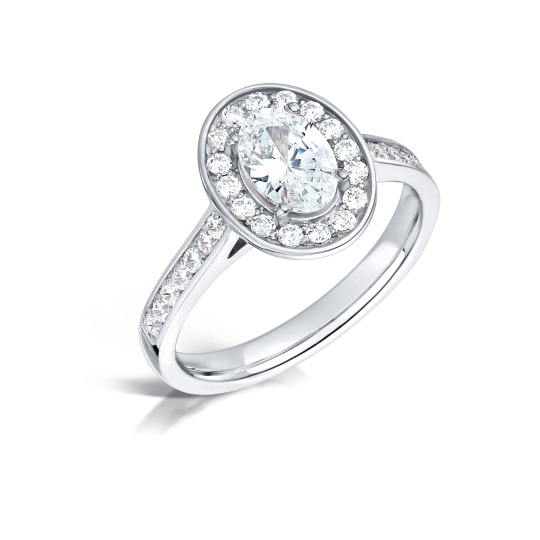 Oval Cut Diamond Ring In A Grain Set Halo Design