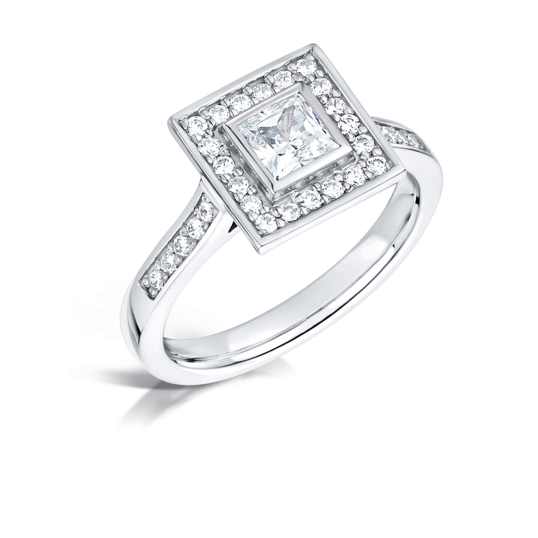 Princess Cut Diamond Ring In A Grain Set Halo Design