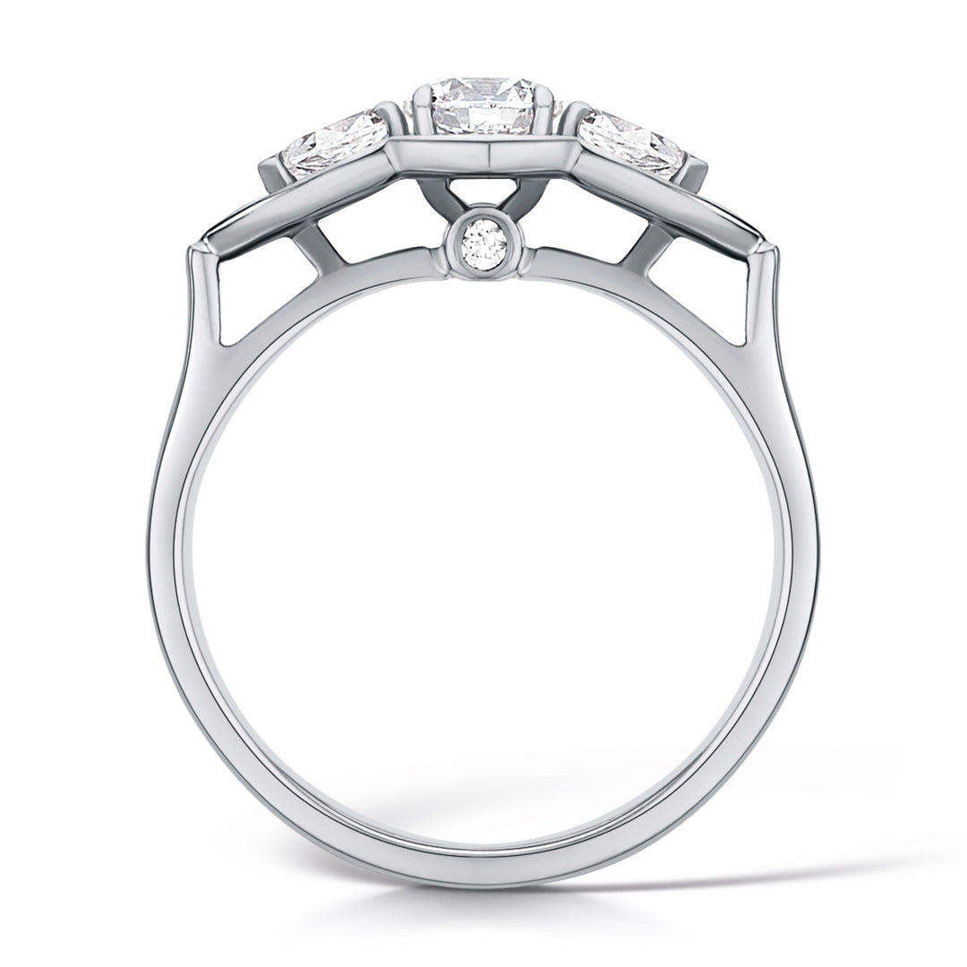 Three Stone Round Brilliant Diamond Ring In A Pear Style Grain Set Halo Design