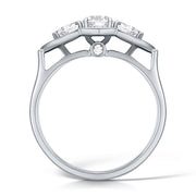 Three Stone Round Brilliant Diamond Ring In A Pear Style Grain Set Halo Design