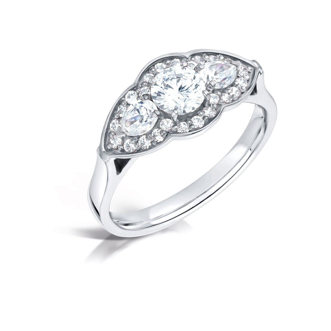 Three Stone Round Brilliant Diamond Ring In A Pear Style Grain Set Halo Design