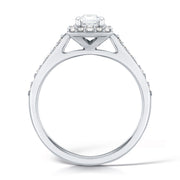Emerald Cut Diamond Ring In A Grain Set Halo Design