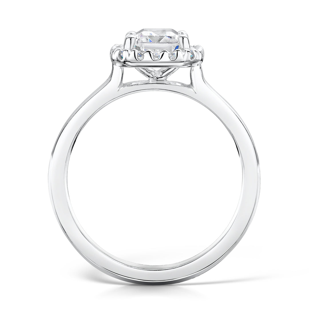 Emerald Cut Diamond Ring In A Micro Set Halo Design