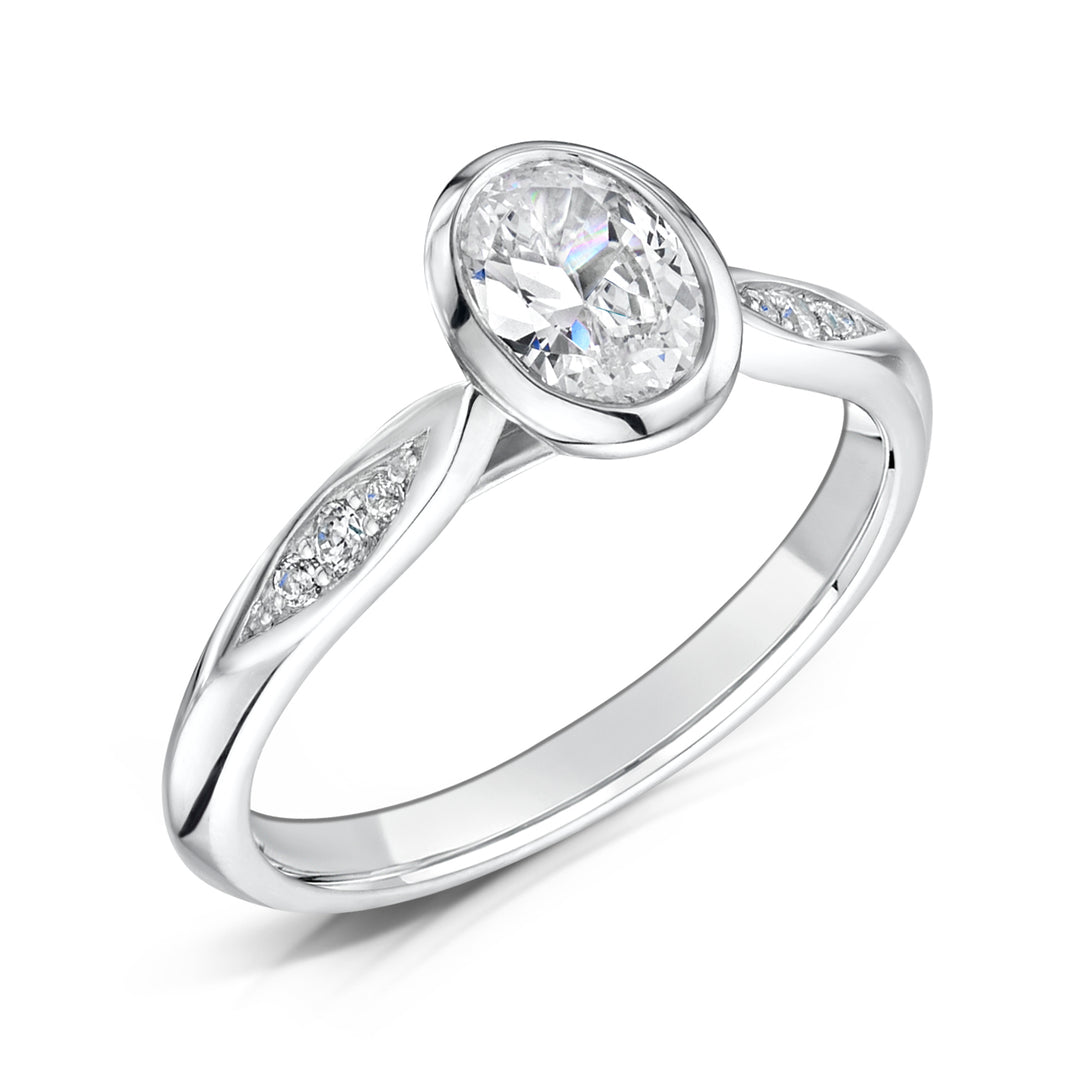 Oval Cut Rubover Diamond Ring With Grain Set Shoulders